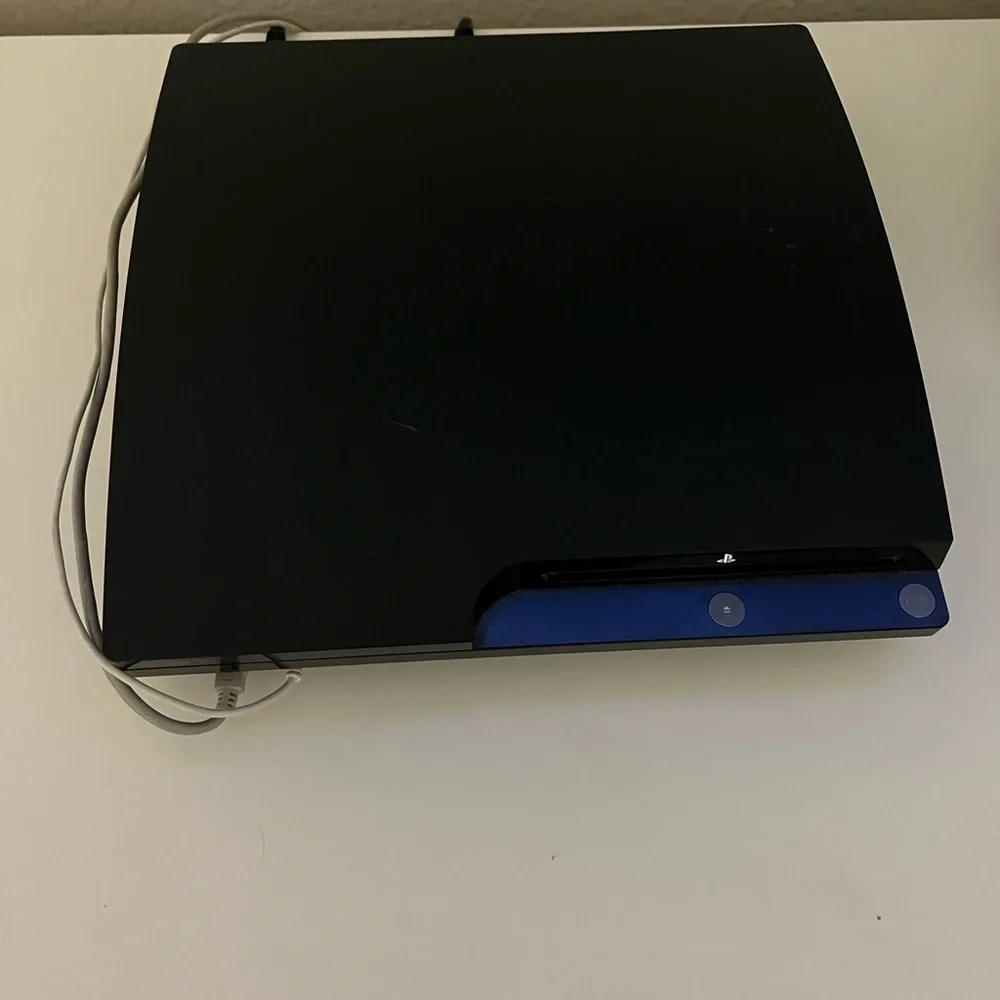 PS3 black comes with everything including over 15 games
