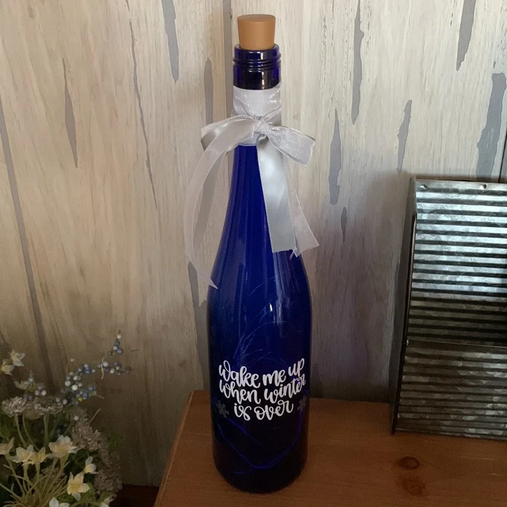 ‘Wake Me When Winter Is Over’ blue wine bottle lantern