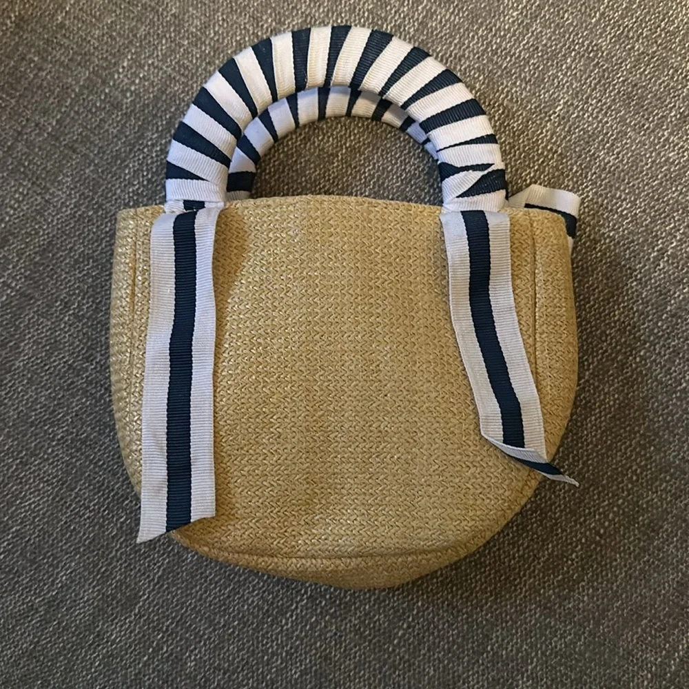Little girl’s straw purse