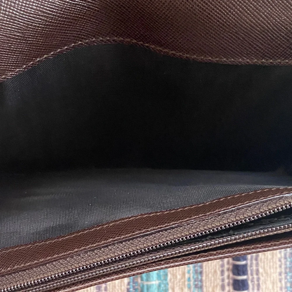 Salvatore Ferragamo Deep brown leather wallet with gold accent