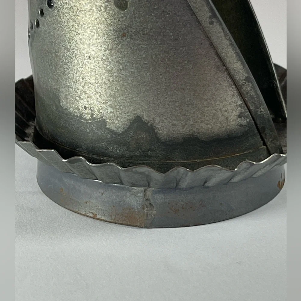Vintage punched tin tea light candle holder
