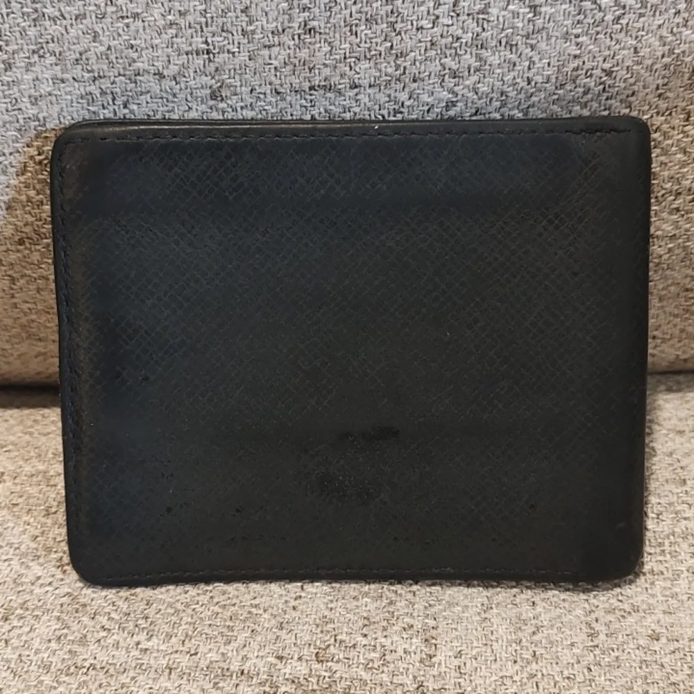 Louis Vuitton wear has wallet