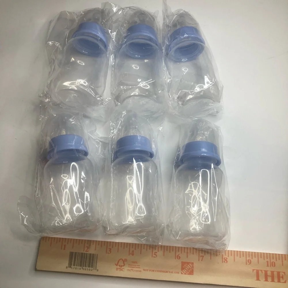 Set of 23 Clear Baby Bottles Blue Caps Baby Shower Party favors. 5 1/2 x2 inches