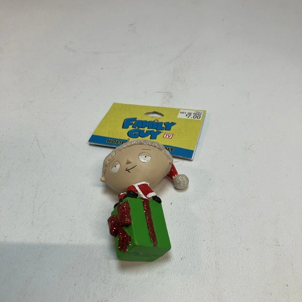 2011 Family Guy's Stewie Sitting On Green Present Christmas Ornament NOS
