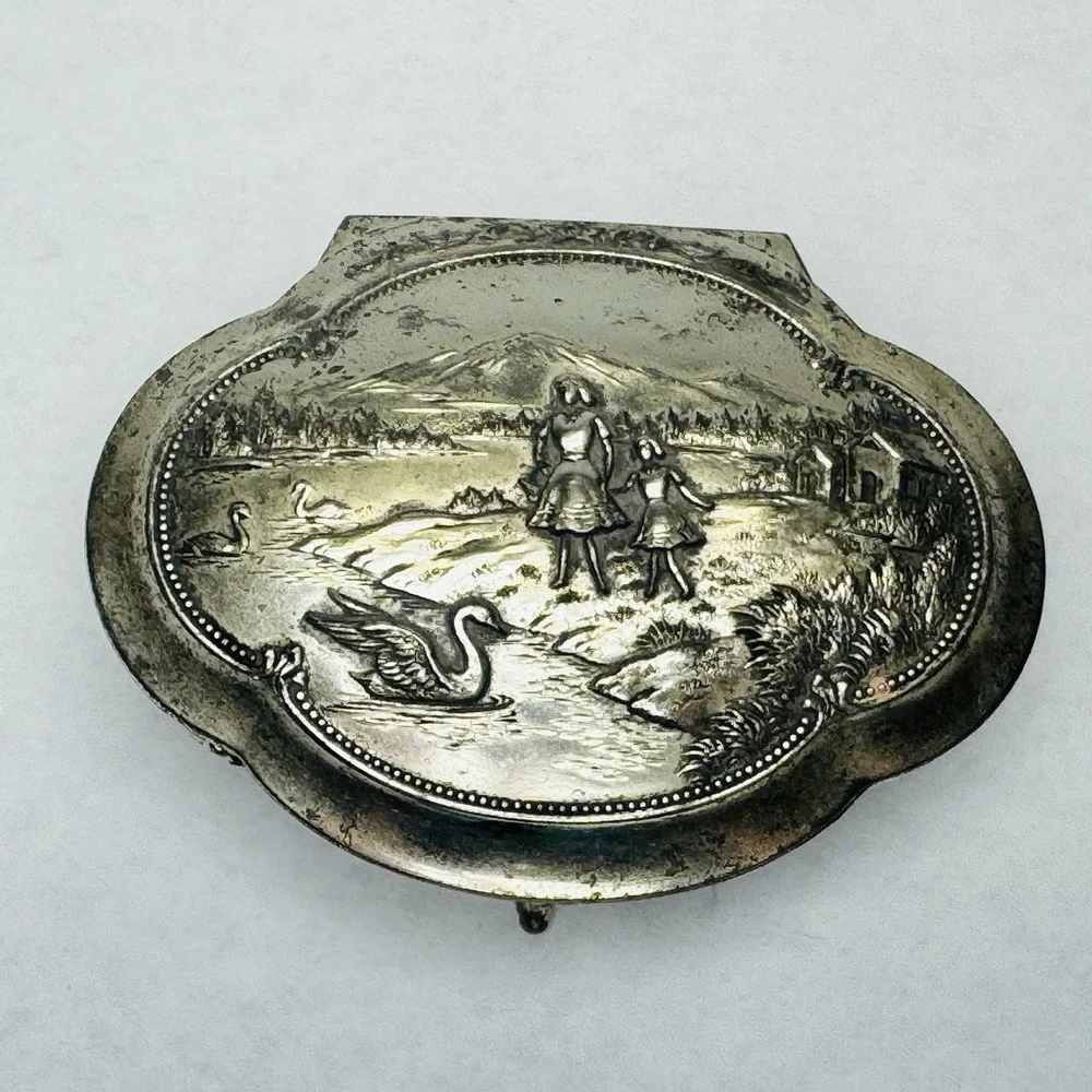 The Unbranded Brand vintage silver