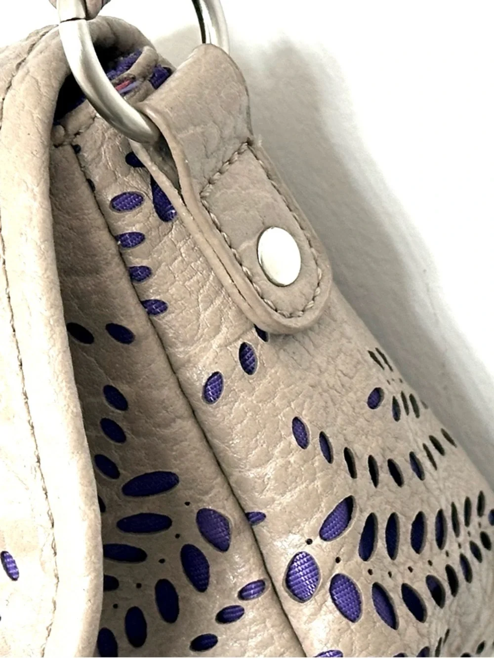 Kensie Girl Taupe Laser-Cut Mini Crossbody Bag with Purple Accent