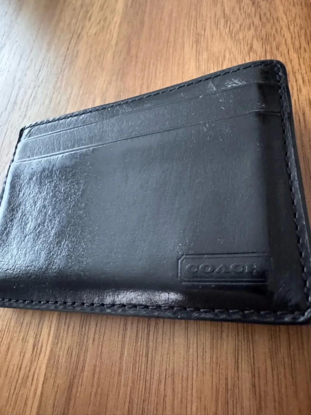Coach sleek leather