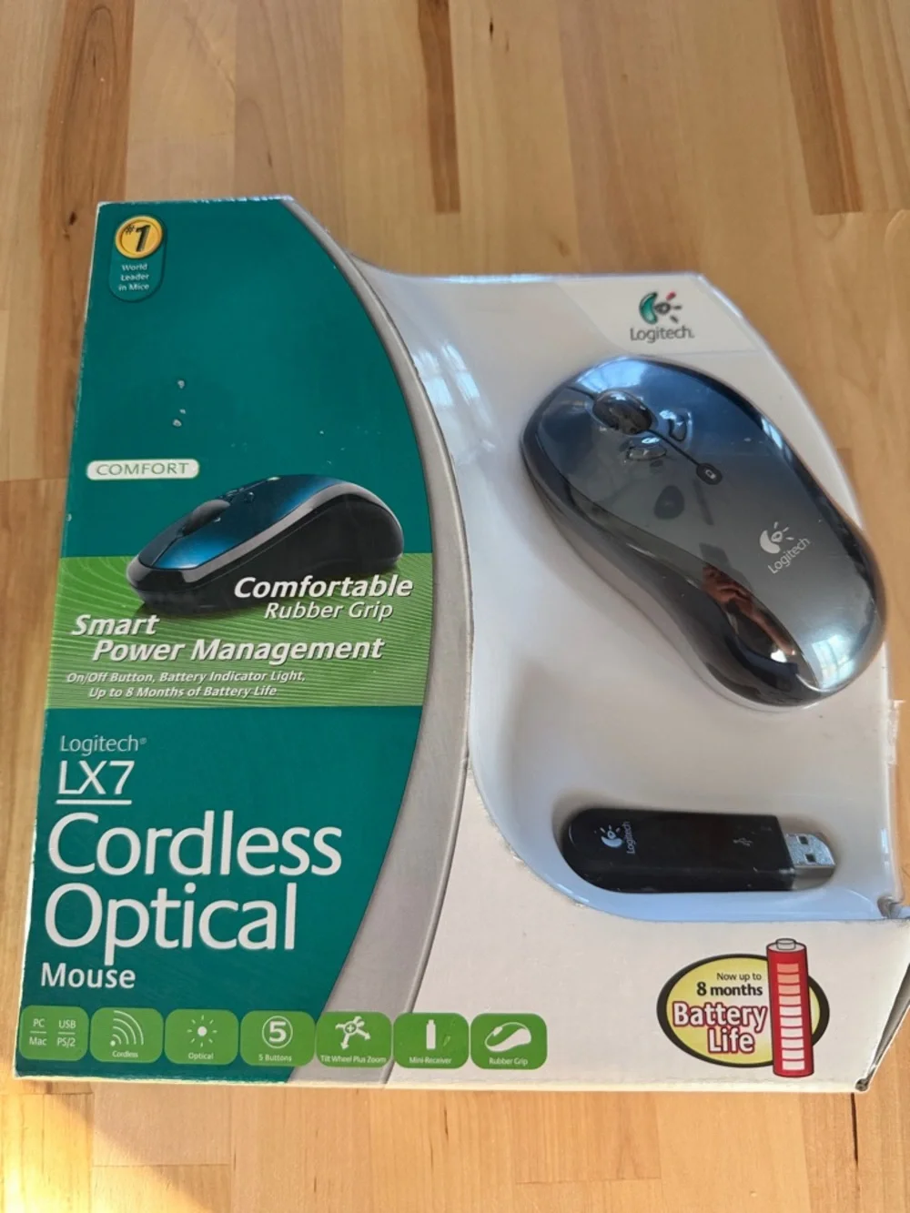 Logitech LX7 Cordless Optical Mouse - Black and Silver Accent