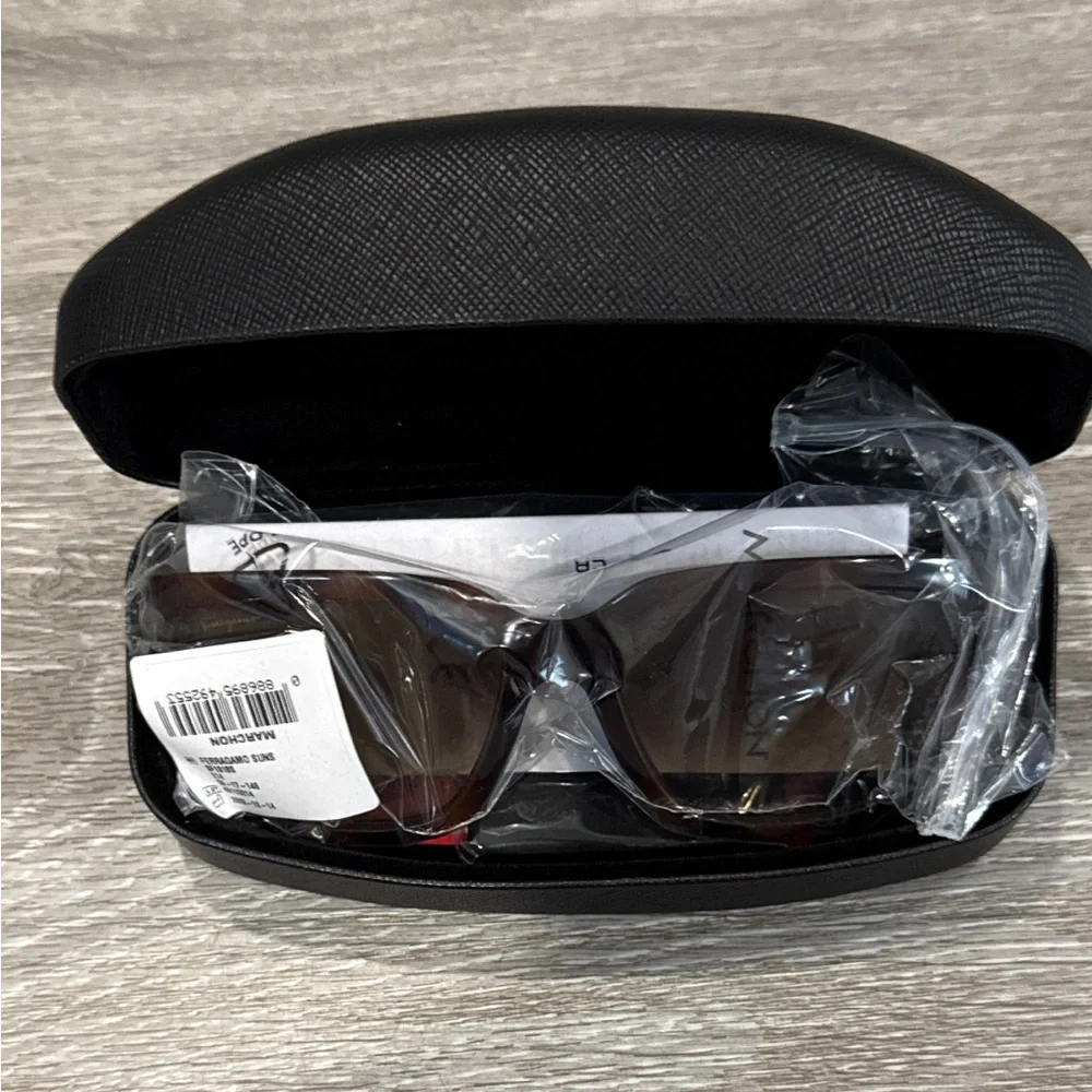 Salvatore Ferragamo Tortoise Sunglasses with SF Logo at Temples.