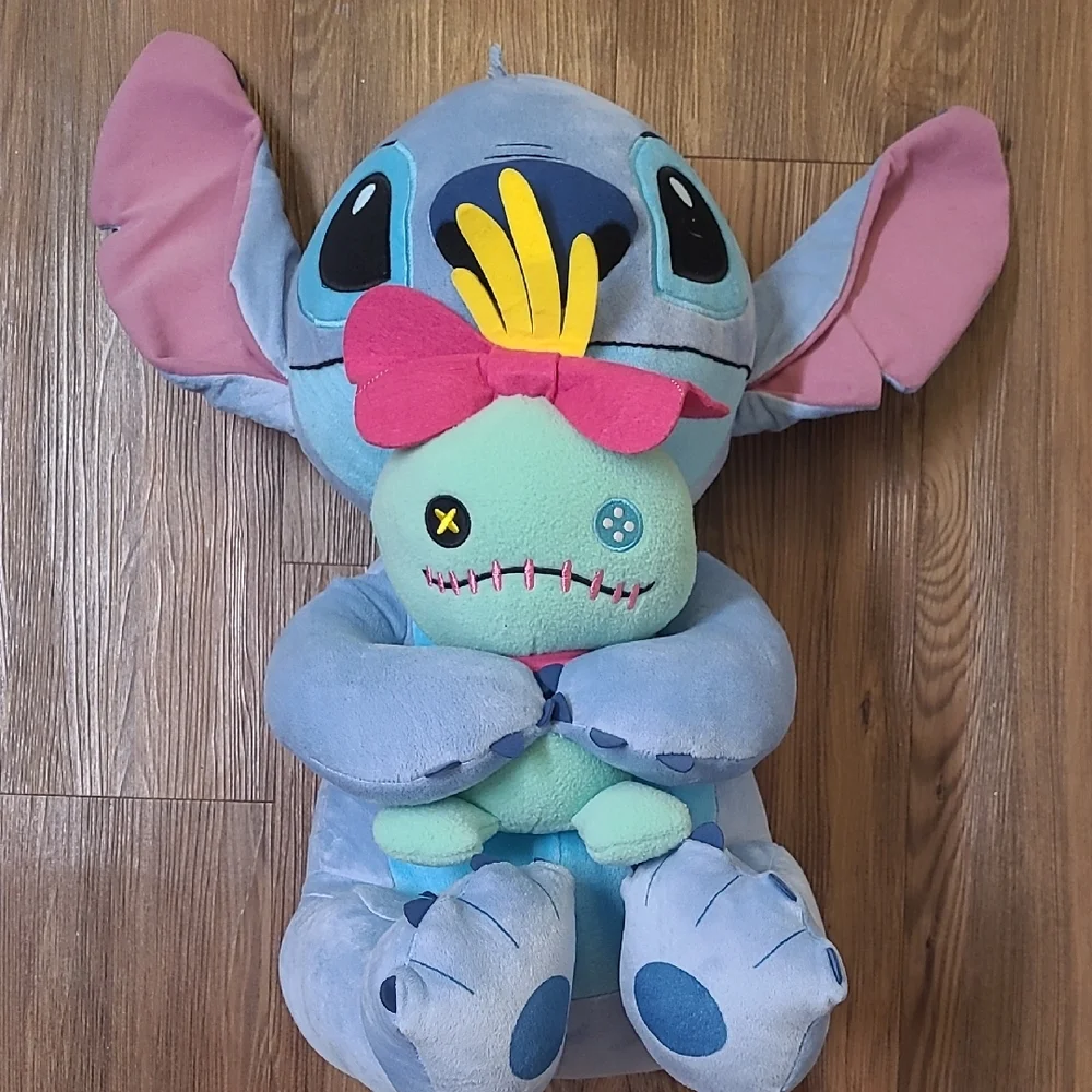 Disney Blue and‎ Pink Stitch Plush with Green Doll used good condition.