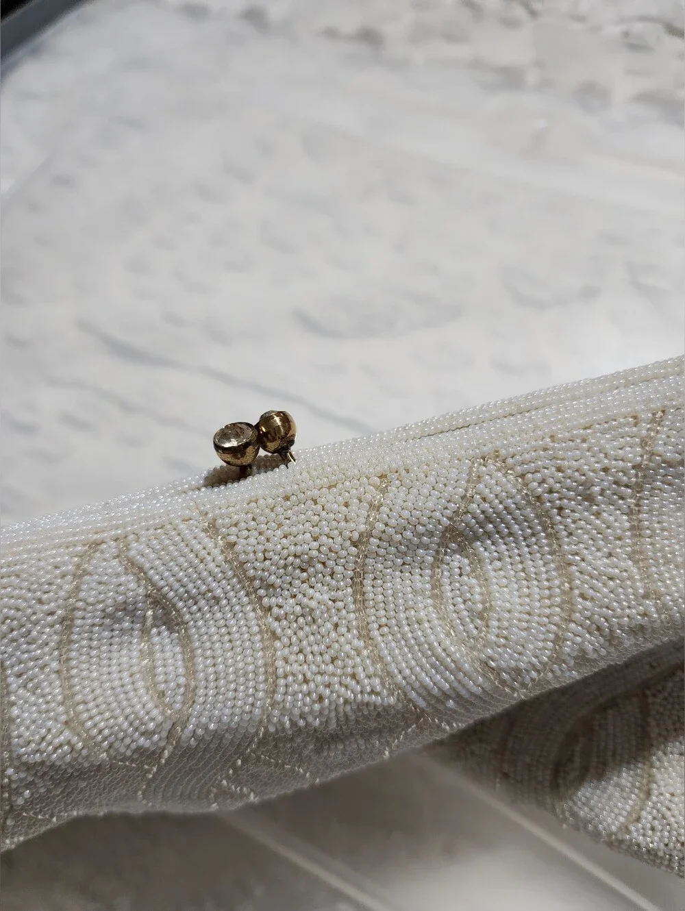 Magid beaded clutch