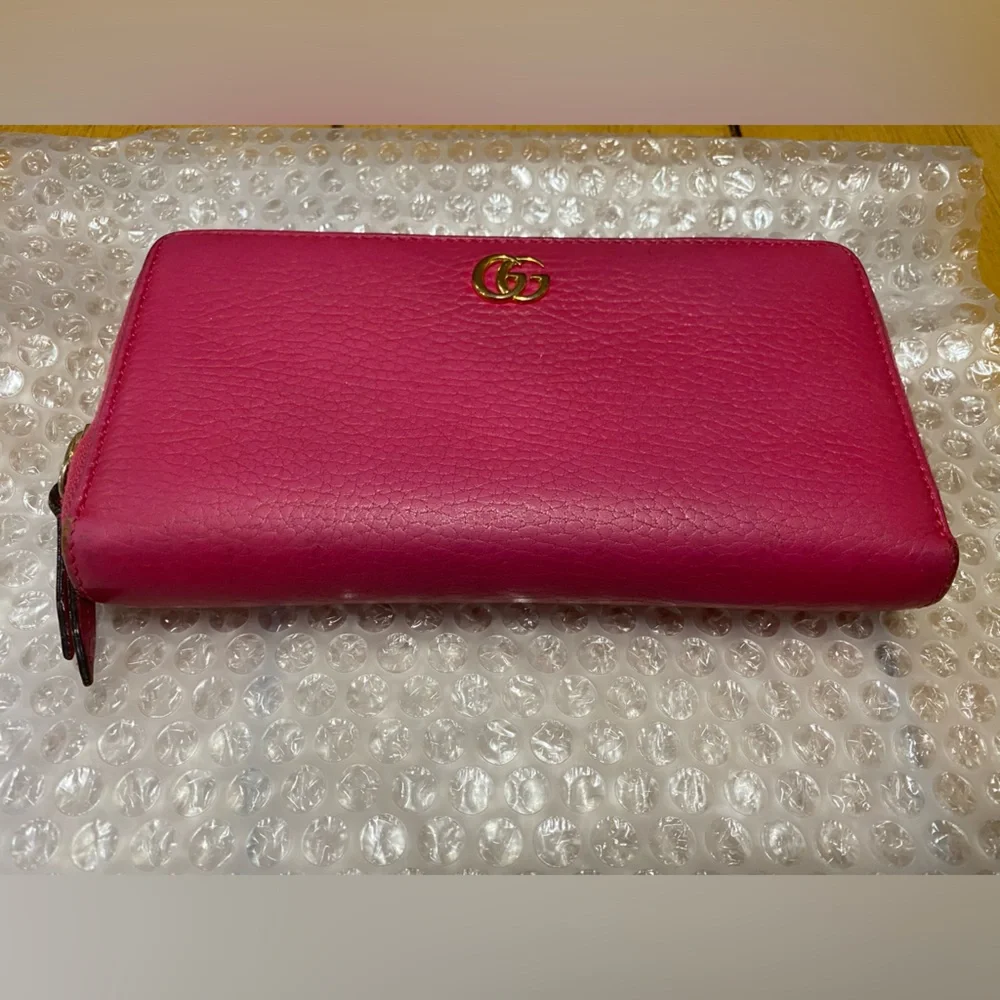 Gucci GG Marmont zip-around wallet in shocking pink