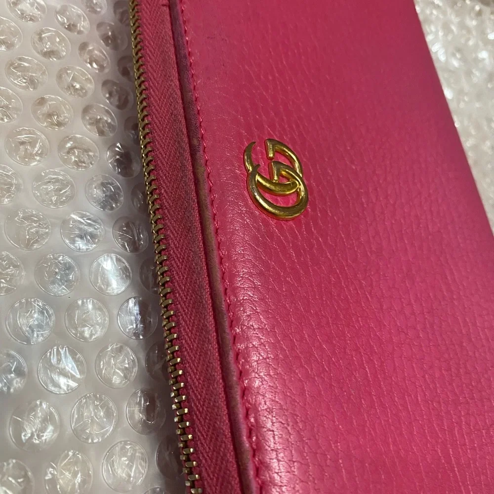 Gucci GG Marmont zip-around wallet in shocking pink