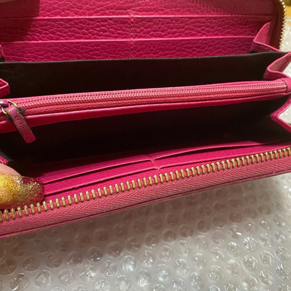 Gucci GG Marmont zip-around wallet in shocking pink