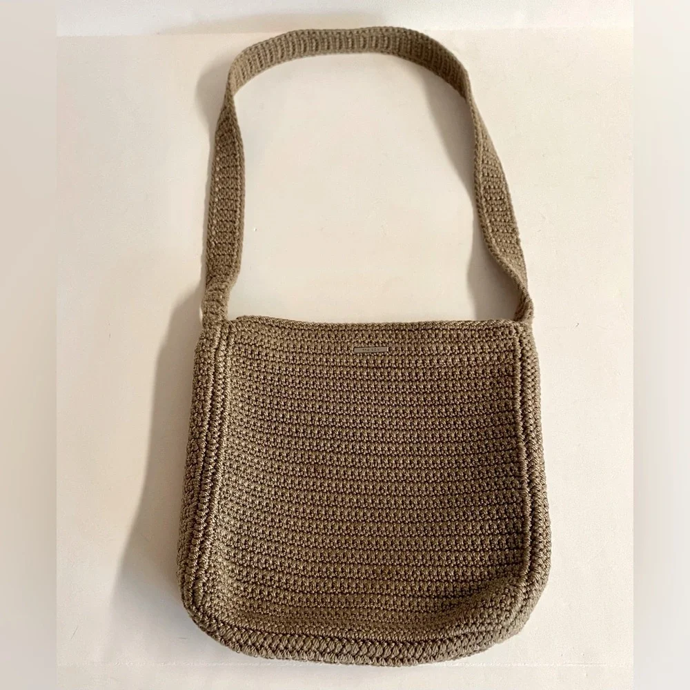 The Sak- Classic neutral crocheted Boho crossbody bag.In great condition.