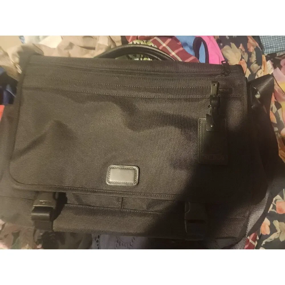 Tumi black 15