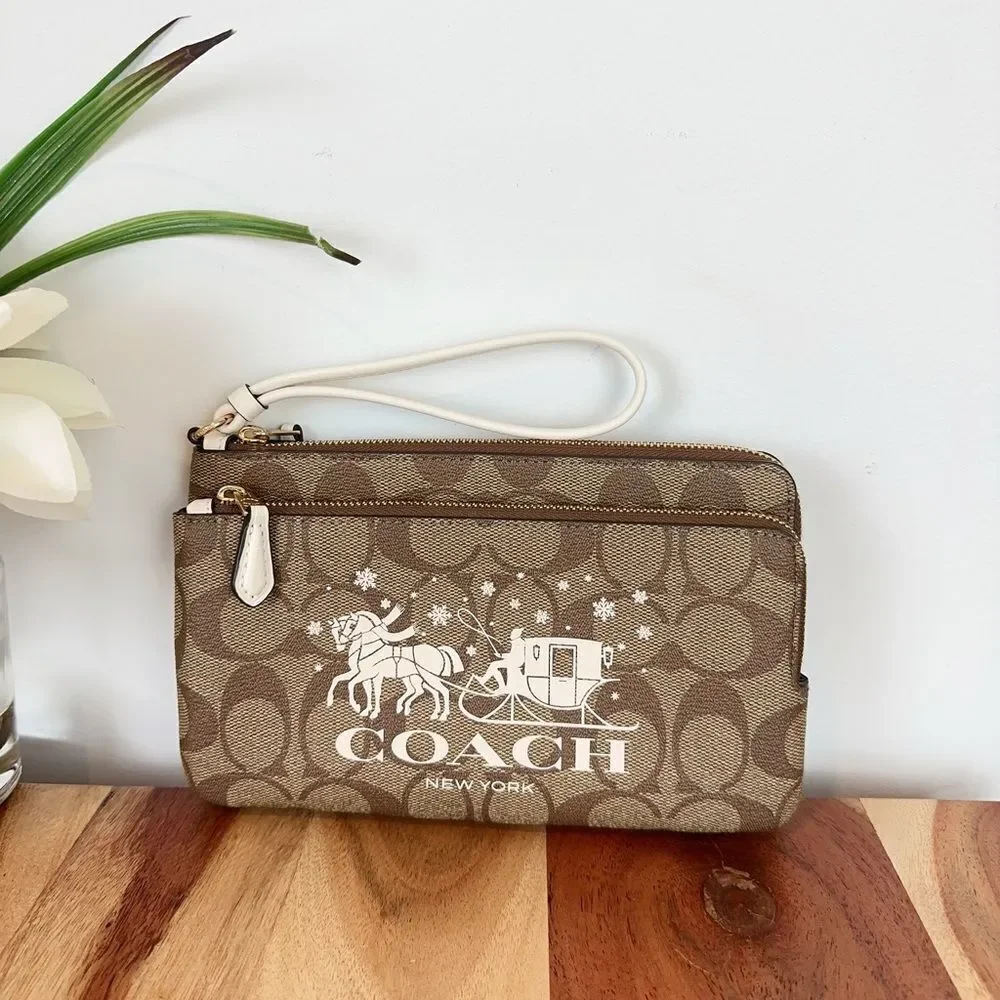 NWT Coach‎ Double Zip Wallet In Signature Canvas With Horse And Sleigh