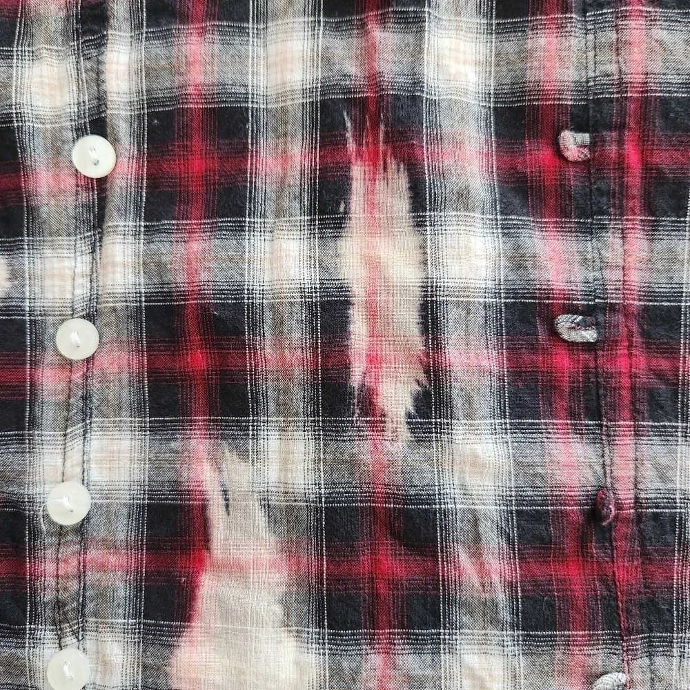 Romeo & Juliet Couture distressed plaid
