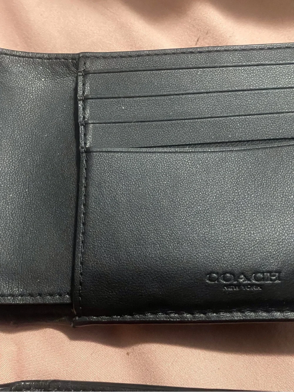 Coach compact bi