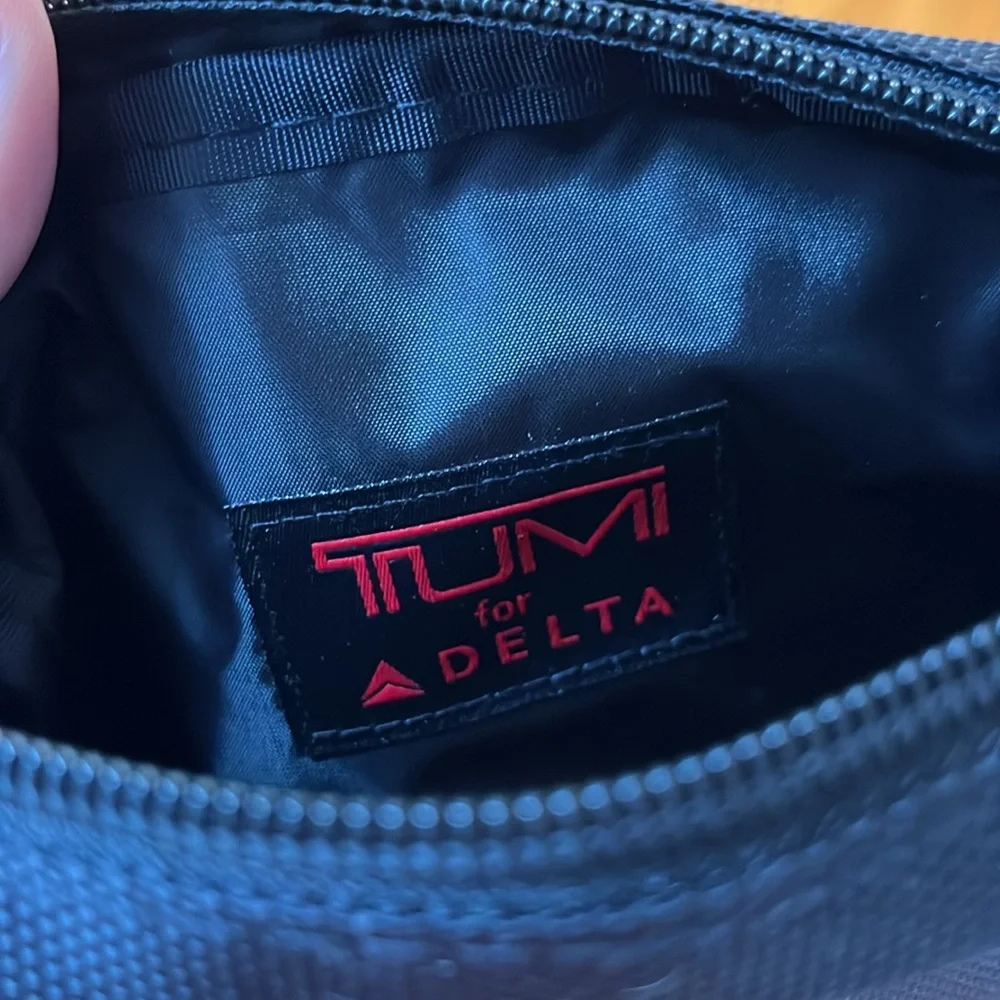 Tumi for Delta small black bag with sleep mask and socks