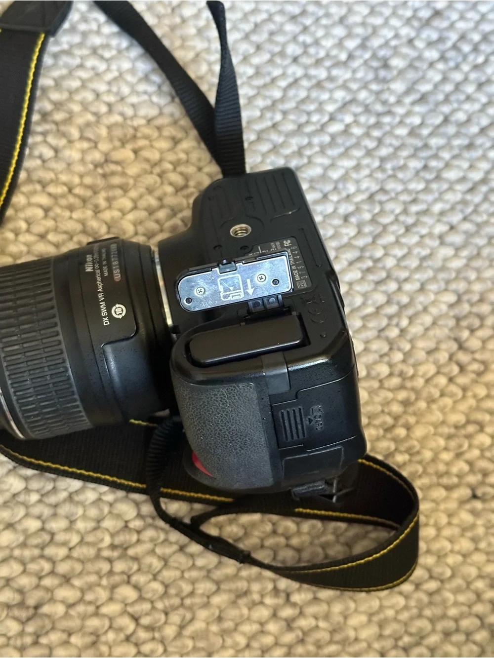 Nikon Black DSLR Camera with Black Lens and Strap