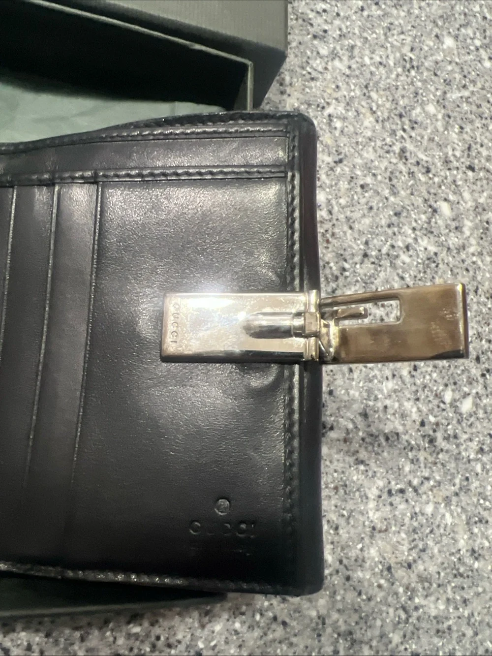 Gucci Black Leather Bifold Card Holder with Silver G-Clip Accent