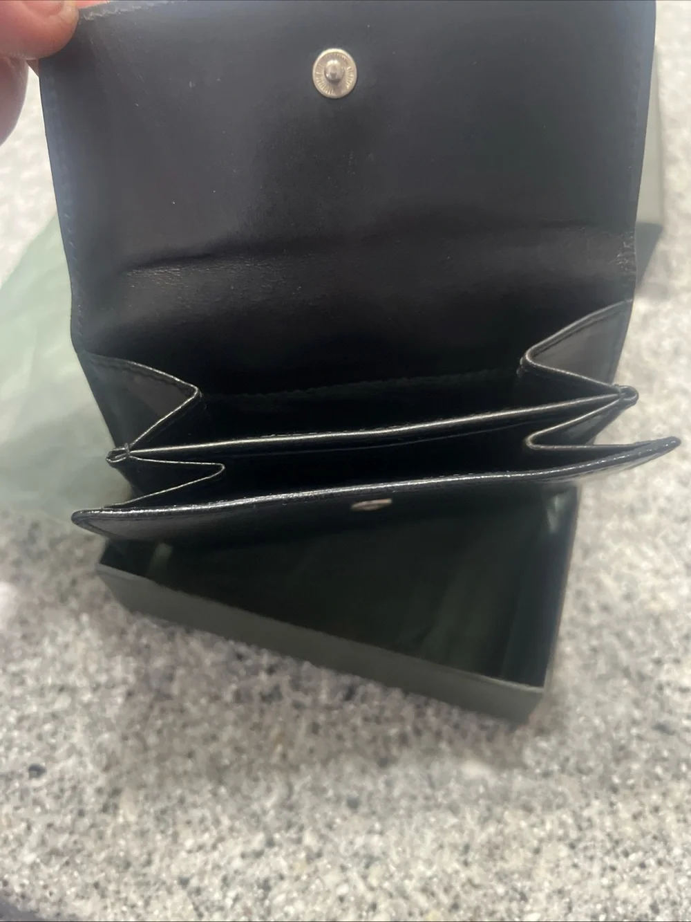 Gucci Black Leather Bifold Card Holder with Silver G-Clip Accent