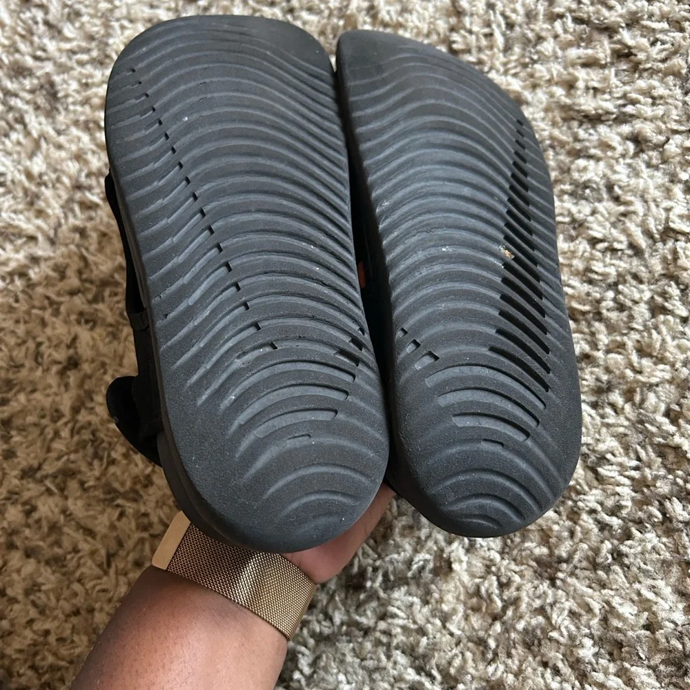 Nike Kids Black Slide Sandals with White Swoosh Accent