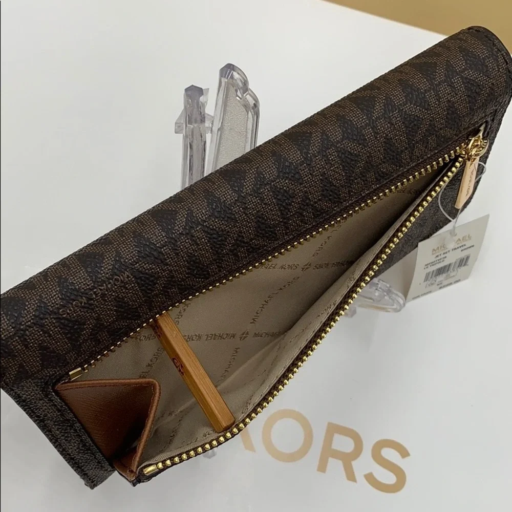 Michael Kors travel window signature