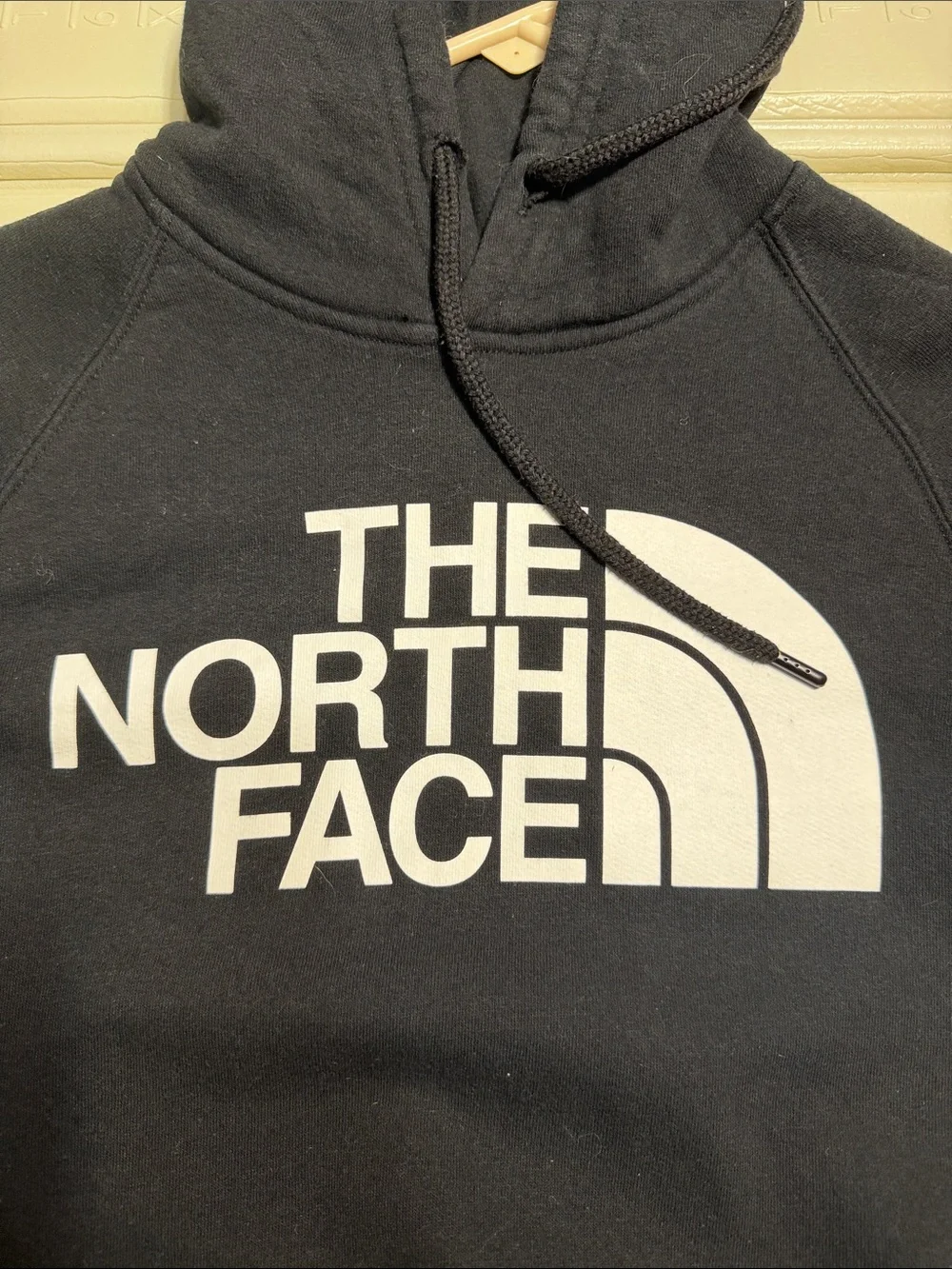 The North Face Black Hoodie with White Logo