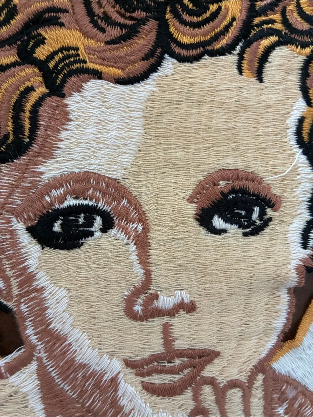 Source Unknown embroidered cherub