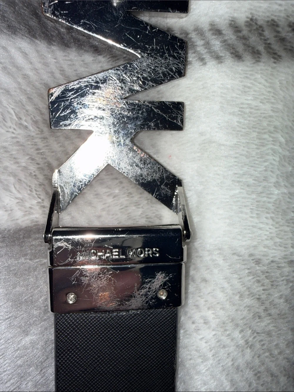 Michael Kors prominent silver leather