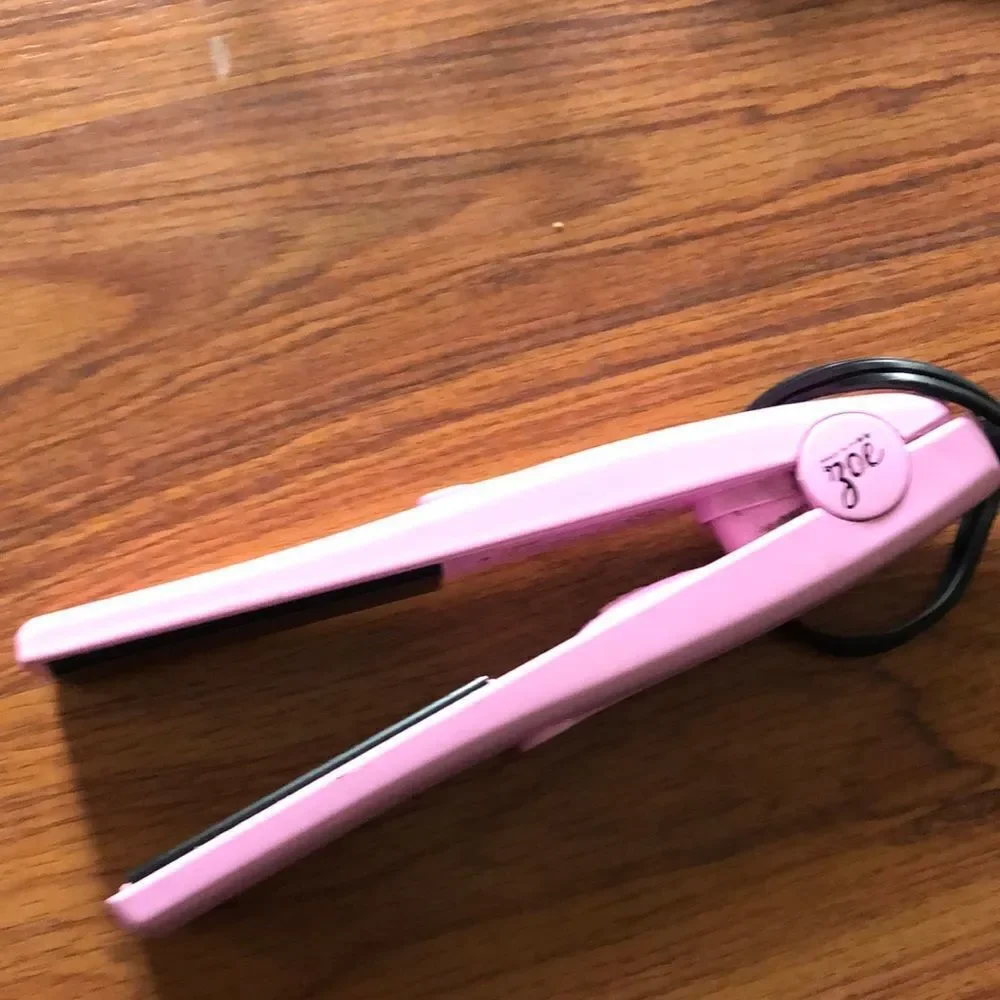 ZOE mini pink flat iron travel iron.