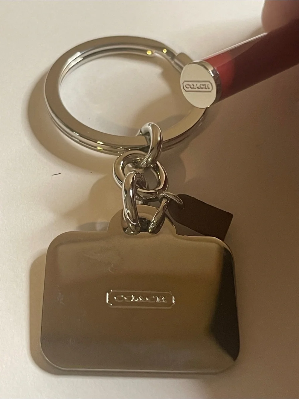 COACH Silver Bag Keychain and Coach Pen