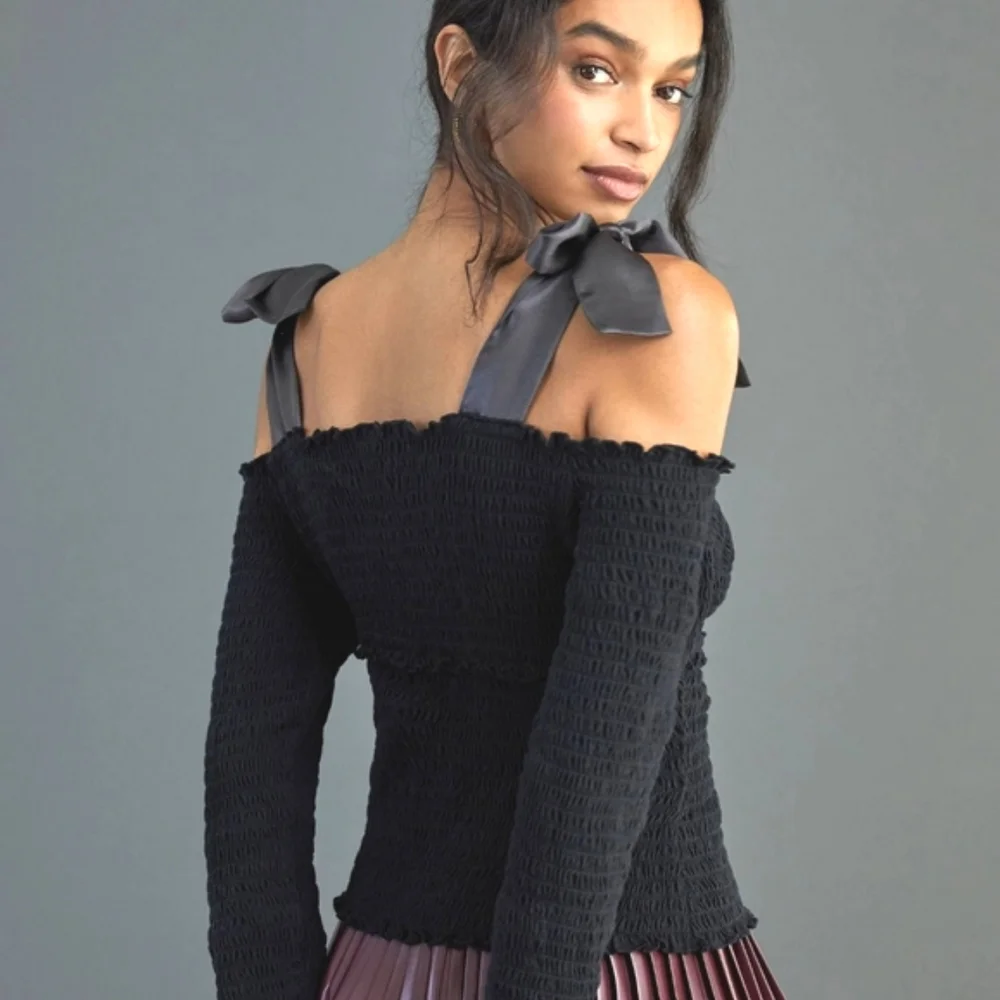 Anthropologie bow off shoulder smocked top black