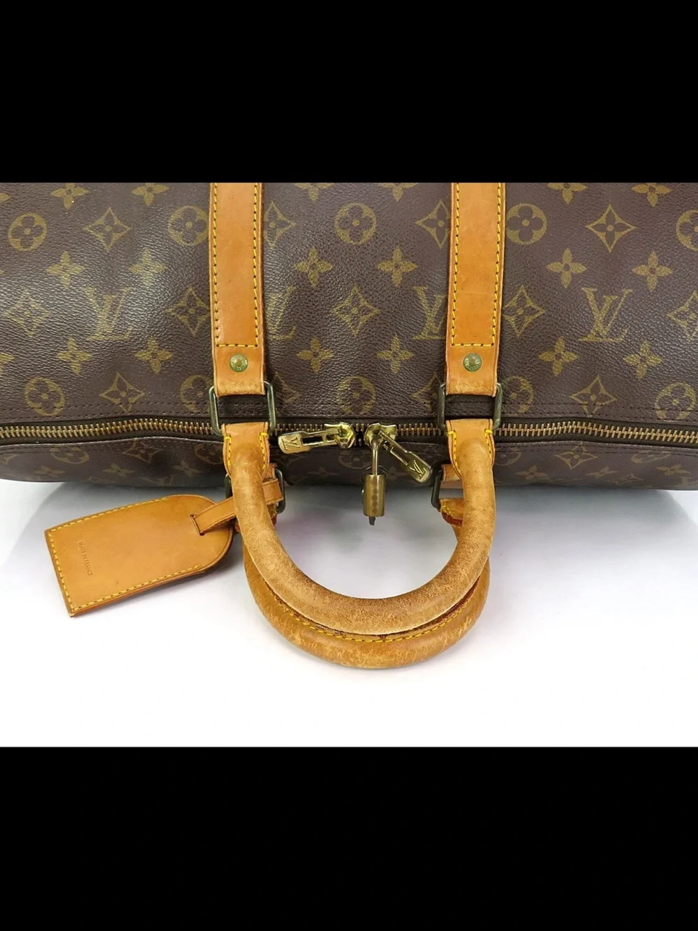 Louis Vuitton Brown Monogram Canvas Duffle with Tan Leather Trim