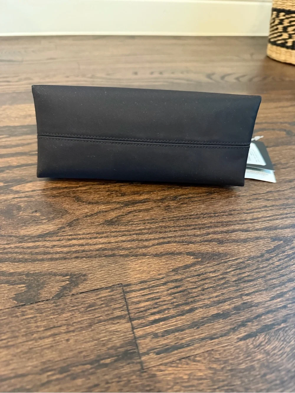 kate spade black toiletry pouch with zip-top