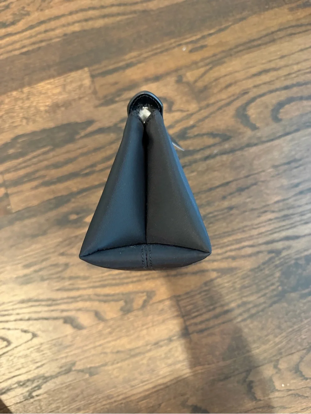 kate spade black toiletry pouch with zip-top