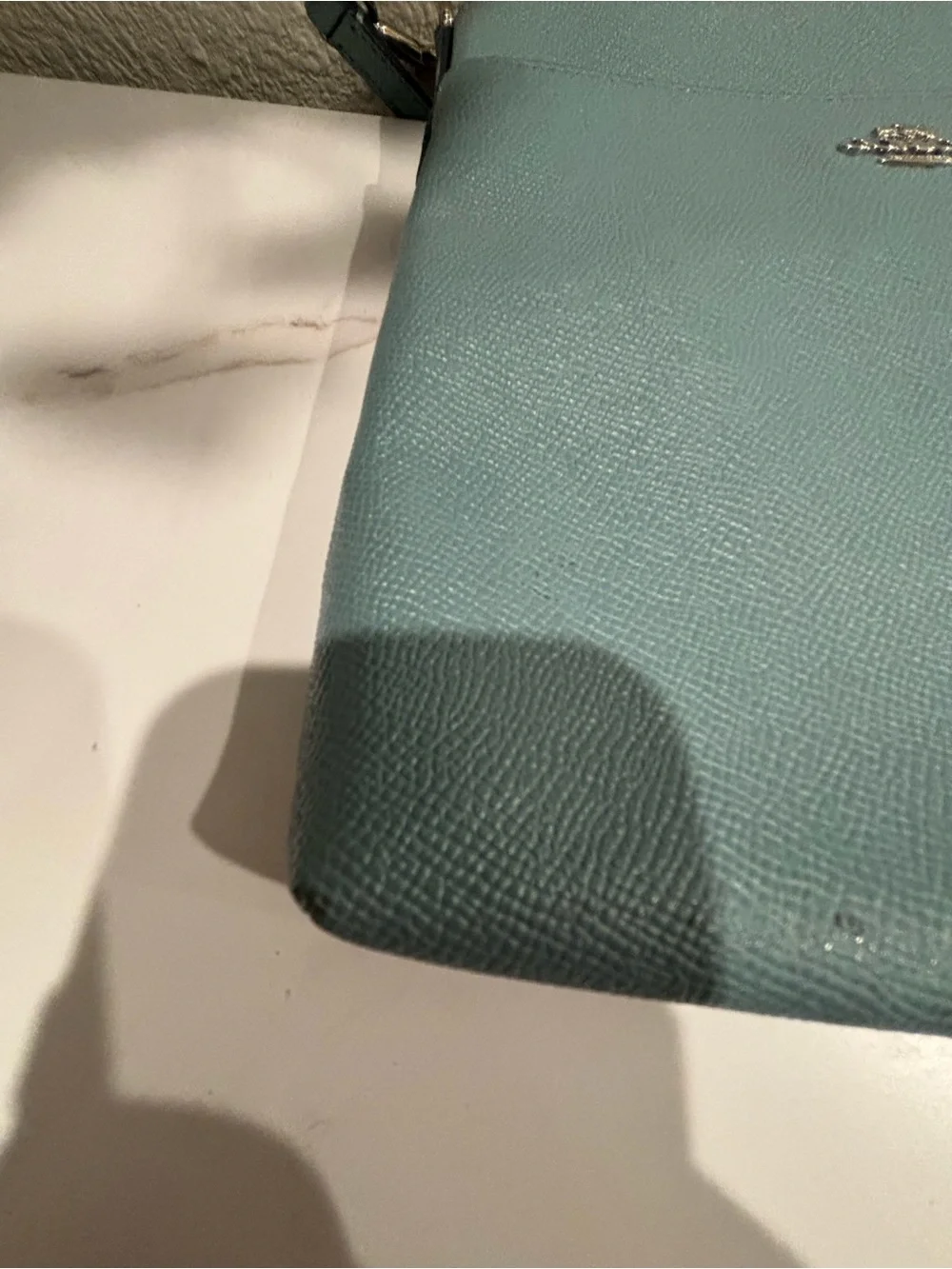 Coach compact pebble