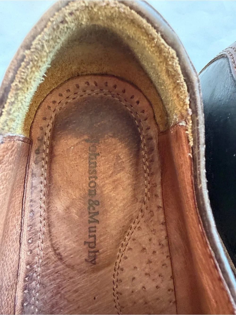 Johnston & Murphy leather closure detailing