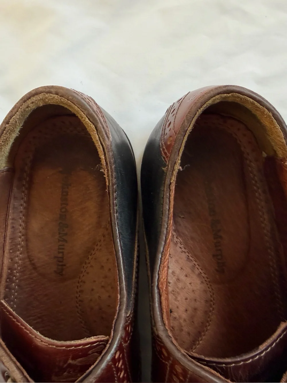 Johnston & Murphy dark brand