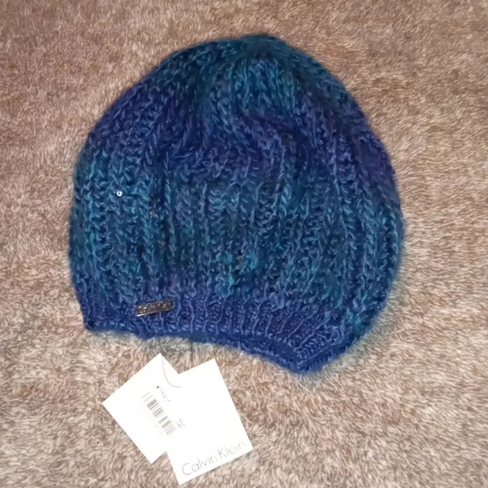 Calvin Klein NWT peacock ombre sequin beanie