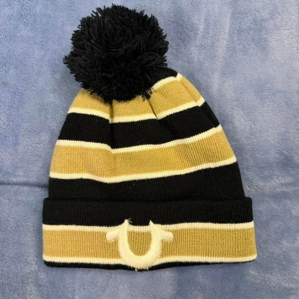 True Religion‎ black and gold striped beanie with pom pom