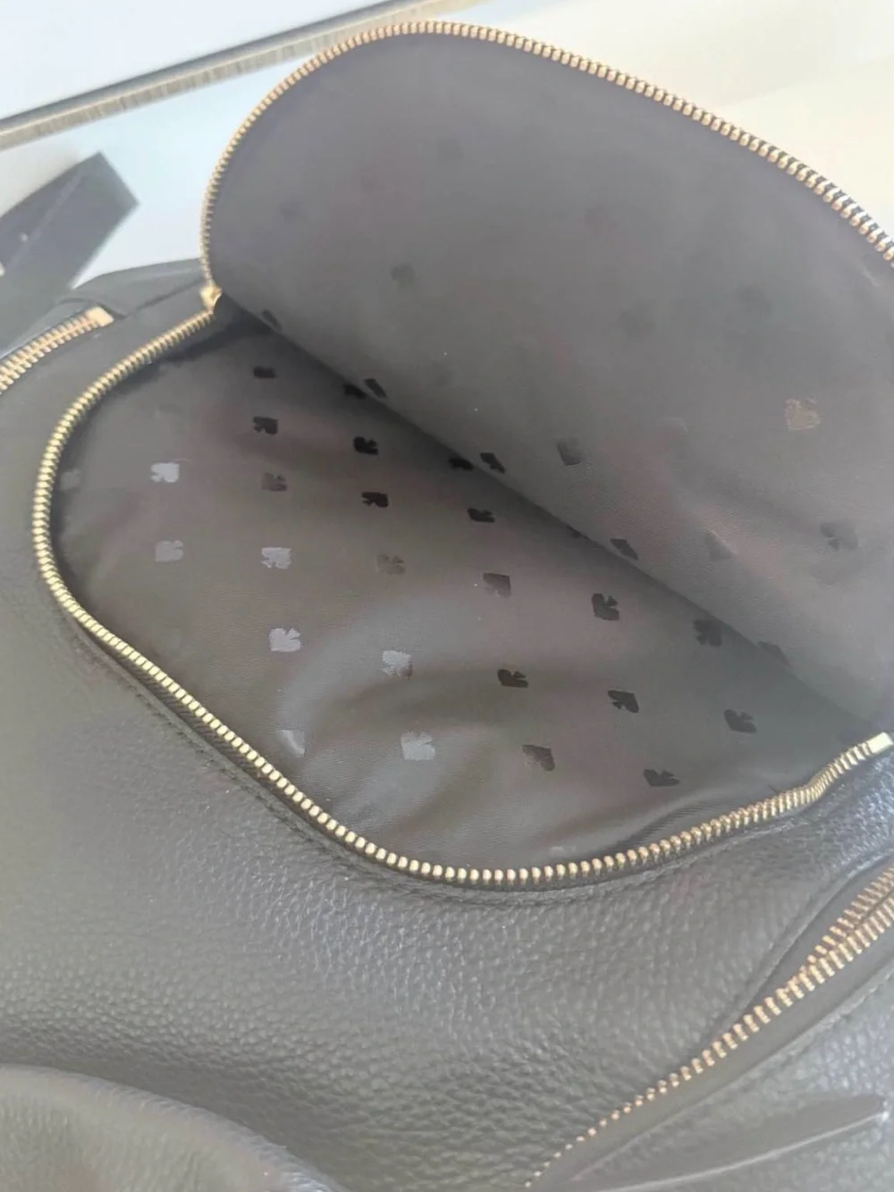 kate spade Black Pebbled Leather Backpack with Gold Hardware
