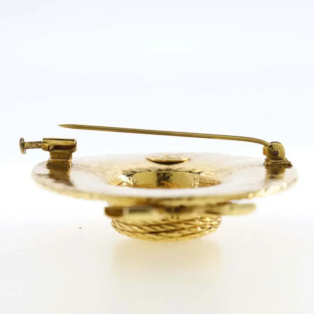 CHANEL gold straw