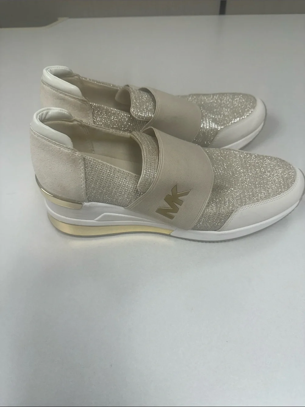 MICHAEL KORS Women’s Size 10 Felix wedge champagne gold slip on fashion sneakers