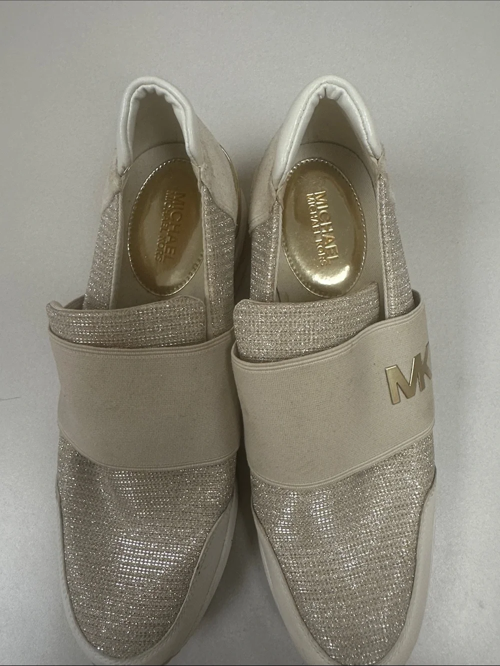 MICHAEL KORS Women’s Size 10 Felix wedge champagne gold slip on fashion sneakers