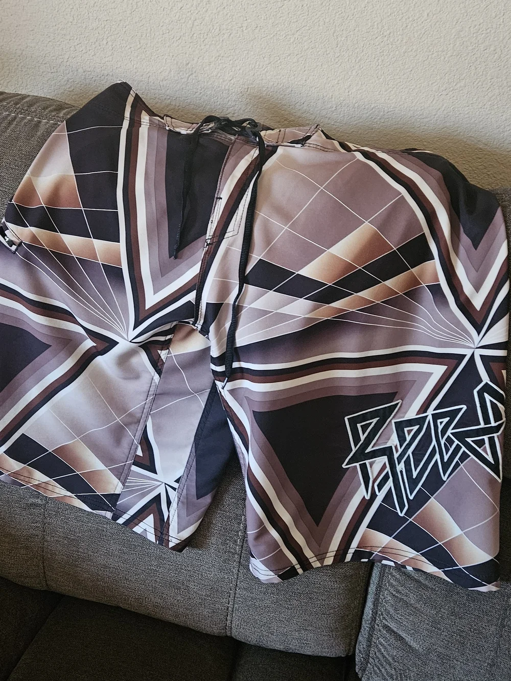 Geometric Star Print Swim Shorts in Brown and Black