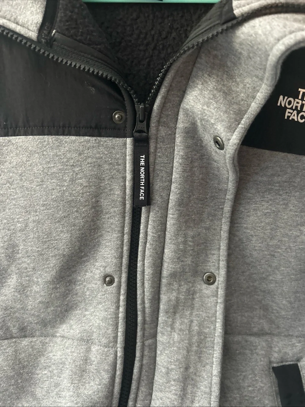 The North Face Men’s Gray and Black Hooded Fleece Jacket