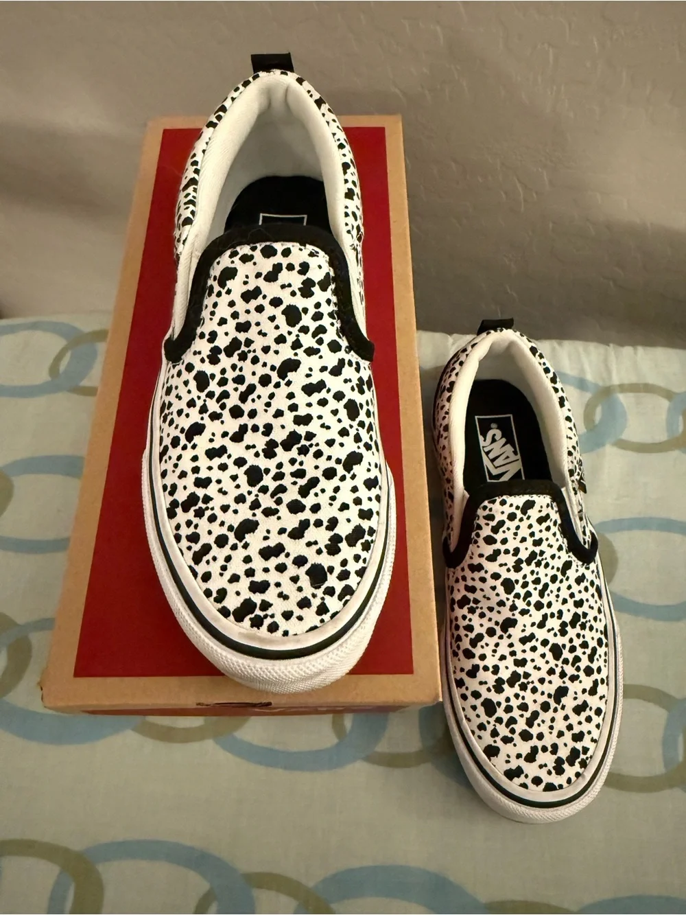 Vans Kids Slip-On Sneakers in White with Black Spot Print
